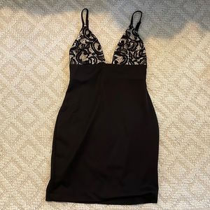 Mini dress with adjustable straps. Great for formals!